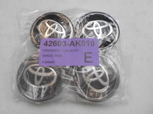 Jeu de 4 bouchons centraux TOYOTA TUNDRA 2022-2024 TACOMA 24-25 42603-AK010 *NEUF* OEM - Photo 1 sur 10