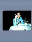 GAY INTEREST PHOTO R+5612 MAN SITTING AT TABLE SMOKING CIGARETTE