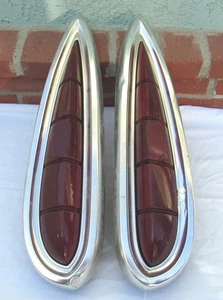 PAIR OF 1959 CHEVROLET TAIL LIGHTS WITH HOUSING, LENS AND BEZEL - Picture 1 of 11