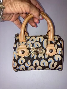 Mini Bauletto Secret Pon Pon con manici e finiture in vacchetta - Foto 1 di 9