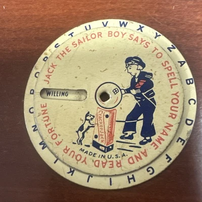 De colección 1930 Tin Litho Cracker Jack Prize "Deletrea tu nombre lee tu fortuna" Foto 1 de 4