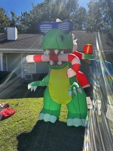 8FT Christmas Inflatable Santa Claus Ride Green Dinosaur with Candy Cane - Picture 1 of 5