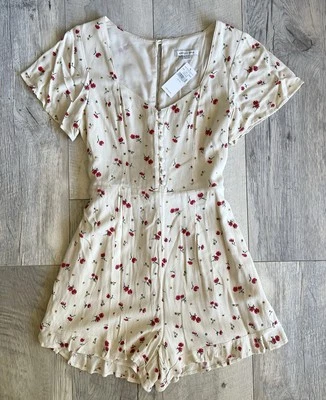 全新带标签 AMERICAN EAGLE AEO 花卉甜心喇叭袖连身裤 XS — 第 1/4 张图片