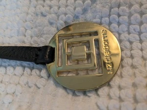 Liz Claiborne Gold Logo Decorative Tag Charm with leather strap - Picture 1 of 3
