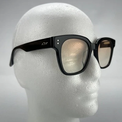 Gafas Gentle Monster Una.C N Serie S 'Luz Azul' Naranja Lentes Marco Negro Foto 1 de 4