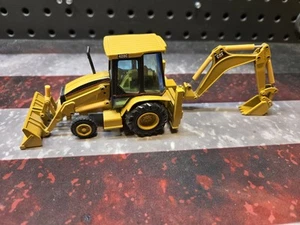 1 64 Caterpillar 428 Backhoe Diecast - Picture 1 of 4