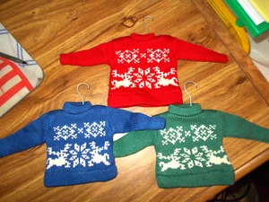 3 *LANDS END* CHRISTMAS ORNAMENT SWEATERS RED,BLUE & GREEN on HANGERS 5" x 5" - Picture 1 of 8