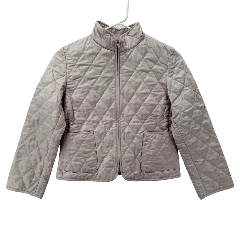 Chaqueta acolchada Burberry para niñas 10 años rosa forro a cuadros Nova cremallera bolsillos delanteros Foto 1 de 4