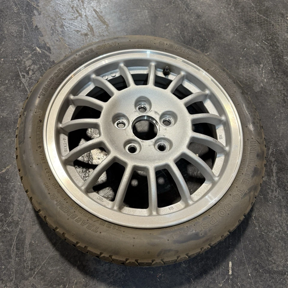 Neumático de repuesto compacto para Mazda RX7 86-91 5 orejetas Enkei Donut ahorro de espacio FC Foto 1 de 4