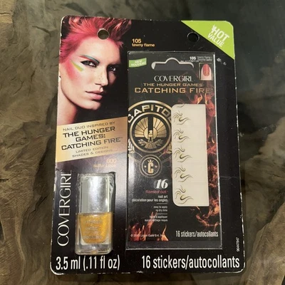 NUEVO Juegos del Hambre BRONCE SELLADO Dúo de Uñas Calcomanías Disfraz Juegos con disfraces Cubierta Niña Foto 1 de 2