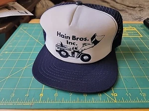 Vintage New Era Trucker Hat HAIN BROS. INC Made In Usa Loader On Front - Picture 1 of 5