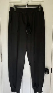 Women's Windbreaker Drawstring Pocketed Black Travel Jogger Pant Large - Picture 1 of 5