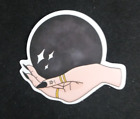 Hand With Black Fingernails Holding Black Crystal Ball Sticker 2" x 2.75"