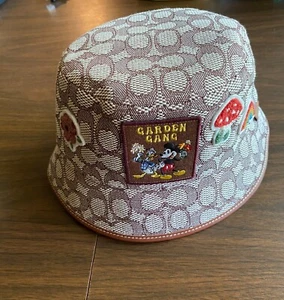 Disney X Coach Signature Jacquard Bucket Hat EPCOT Flower and Garden 2023 NWT - Picture 1 of 5