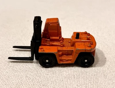 Carretilla elevadora Tomica Pocket Cars Toyota FD200 años 80 No. 12 Orange Construction Tomy Foto 1 de 4