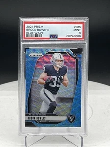 2024 Panini Prizm Brock Bowers #315 Blue Wave #/230 (RC) PSA 9 - Picture 1 of 2