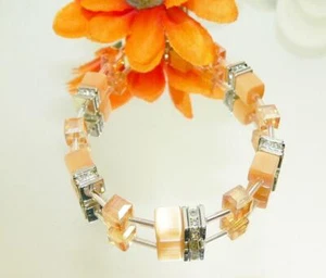 Bracciale Cubo Cat Eye Salmone Albicocca Cristallo Vetro AB Strass 507i - Foto 1 di 4