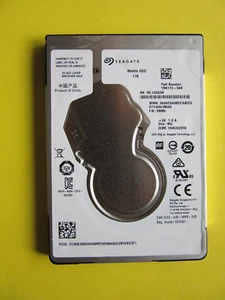 Seagate ST1000LM035 1RK172-568 7mm 1TB 2.5" HDD Aug 2018 China WU SBM3 WL1 - Picture 1 of 7