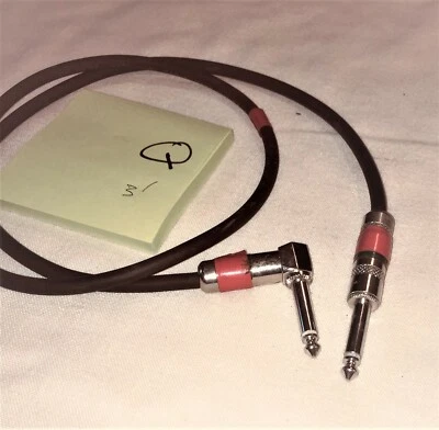 LOT 616Q:  ProAudio Jumper Cable: 3 foot ¼ in “L” connector all metal black red - Image 1 of 3