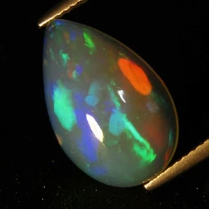 Piedra preciosa en forma de pera de ópalo blanco sin calentar juego de colores naturales de Etiopía de 4,89 quilates - Imagen 1 de 5