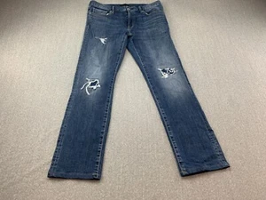 Pantalones de mezclilla Uniqlo elásticos ajustados rectos bajos desgastados para mujer talla 32 lavado medio - Imagen 1 de 14