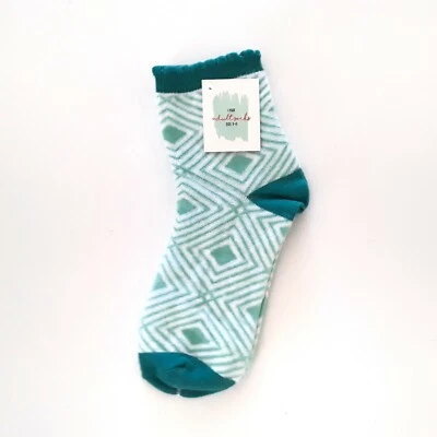 1 par de calcetines de novedad para mujer hechos para venta al por menor talla 9-11 geométricos verdes blancos Foto 1 de 4