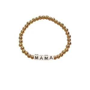 Pulsera Jonesy Madera Llena de Oro Elástica Cuentas Letras Palabras - MAMA - Imagen 1 de 4
