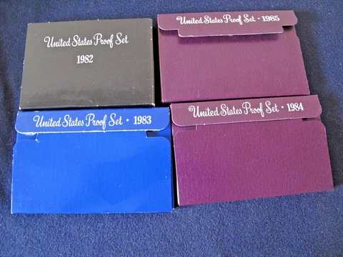 Lot Of 4 - 1982, 1983, 1984, 1985 Proof Sets Cover