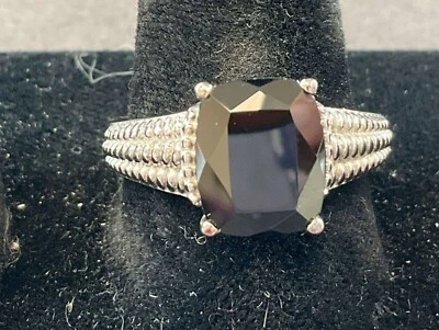 Elegancia Oscura: Anillo Solitario Espinela Negra 4.75ct - Acero Inoxidable 316L, Talla 9 Foto 1 de 4