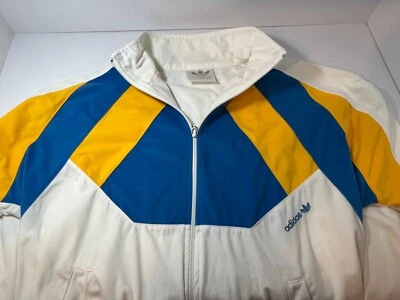 Chaqueta deportiva Adidas vintage blanca con cremallera Foto 1 de 3