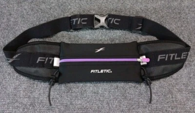 Cinturón de running Fitletic negro ajustable detalles morados  Foto 1 de 4
