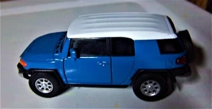 FJ TOYOTA FJ LANDCRUISER BLUE ON BLACK LHD INTERIOR NEW NO BOX FROM MULTIPACK - Picture 1 of 8