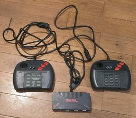 2 Atari Jaguar Controllers and Team Tap