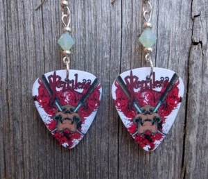 Merciless Skull with Swords Guitar Pick Earrings with Opal Green Crystals - Picture 1 of 4