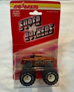 Vintage Majorette Super Rockers - Orange Heavy Metal Toyota 4x4 Monster Truck - Picture 1 of 9