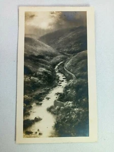Postal de colección Stream pasando por la escena del lado de la montaña RPPC - Imagen 1 de 3
