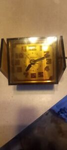 Vintage Sunbeam lighted dial electric clock rotates. Lights up and works fine.