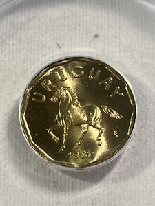 1981-So Uruguay 10 Centesimos Graded MS 67 by ANACS - Picture 1 of 4
