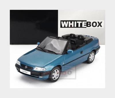 1:24 WHITEBOX Opel Astra F Cabriolet Open 1994 Torquoise Met WB124234 MMC - Image 1 of 2