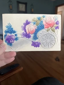 Vintage Heavily Embossed Postcard - Wagon Flowers Rose - backing- 1900’s - Picture 1 of 3