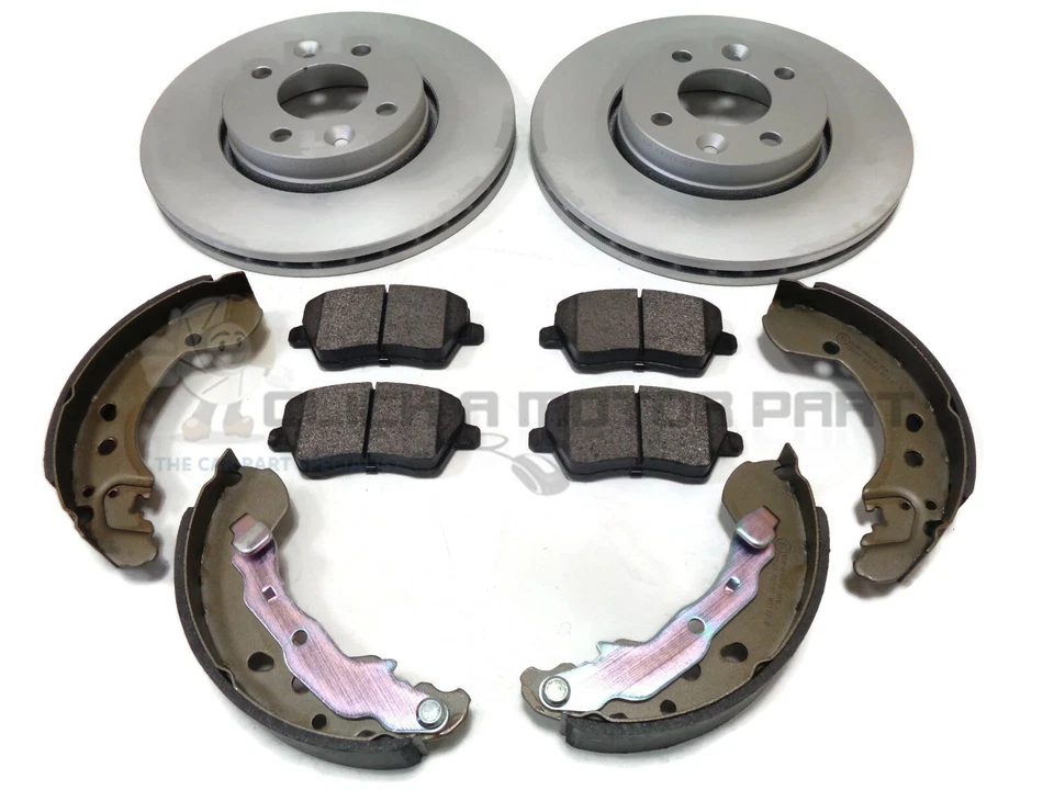 JUEGO DE 2 DISCOS Y PASTILLAS DE FRENO DELANTEROS Y ZAPATOS TRASEROS PARA NISSAN MICRA K12 2002-2009 Foto 1 de 1