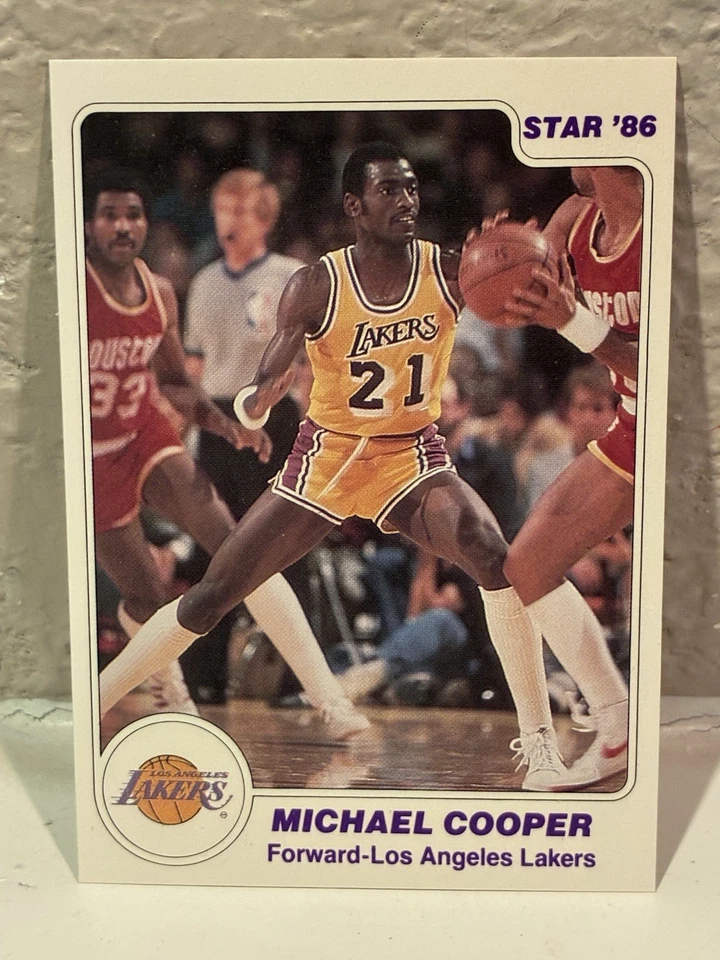 1985-86 Star #27 Michael Cooper LA Lakers NRMT - Image 1 of 2