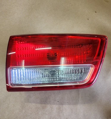 2015-2016 KIA SEDONA LEFT INNER TAILLIGHT HALOGEN OEM 92405-A9000 - Image 1 of 4