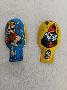 Vintage (2) US Metal Toy Company Clown Blech Clicker Krachmacher Made in USA Clown Girl - Bild 1 von 4