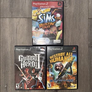 PS2 Games Lot Of 3 - Sims Bustin’ Out, Destroy All Humans!, Guitar Hero 2 - Picture 1 of 4