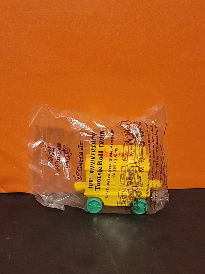 Juguete de tren amarillo vintage Carl's Junior 1996 100 aniversario Tootsie Roll ~ nuevo Foto 1 de 1