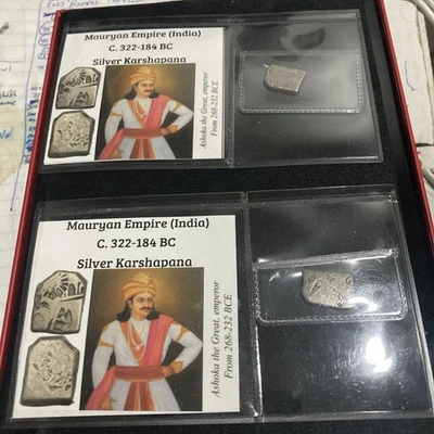 2 - Mauryan Empire Silver Karshapana 322–184 BC India Coins w/ Display Card  - Image 1 of 4