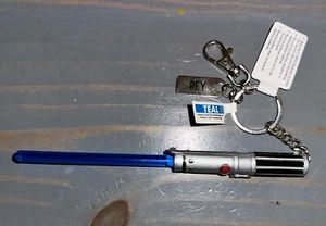 Disney Parks Star Wars Rey Blue Lightsaber Light Up Keychain NEW NWT - Picture 1 of 3