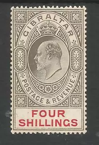 GIBRALTAR SG73 THE 1910 EVII 4/- BLACK AND CARMINE MOUNTED MINT CAT £170 - Picture 1 of 2