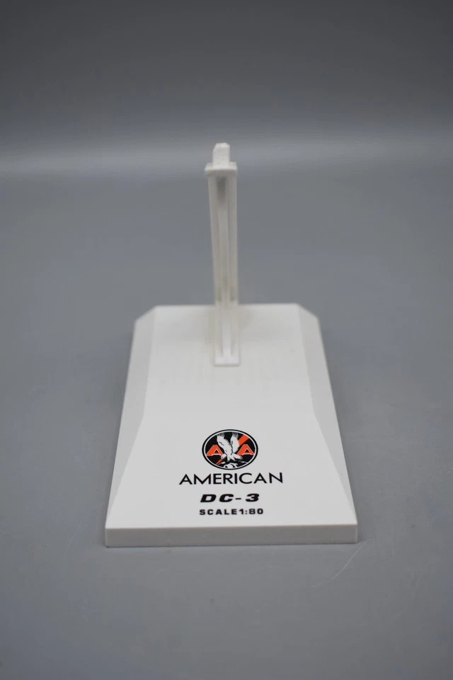 American Airlines DC-3 Plastic Stand, Scale 1:80.  Preowned - Image 1 of 4